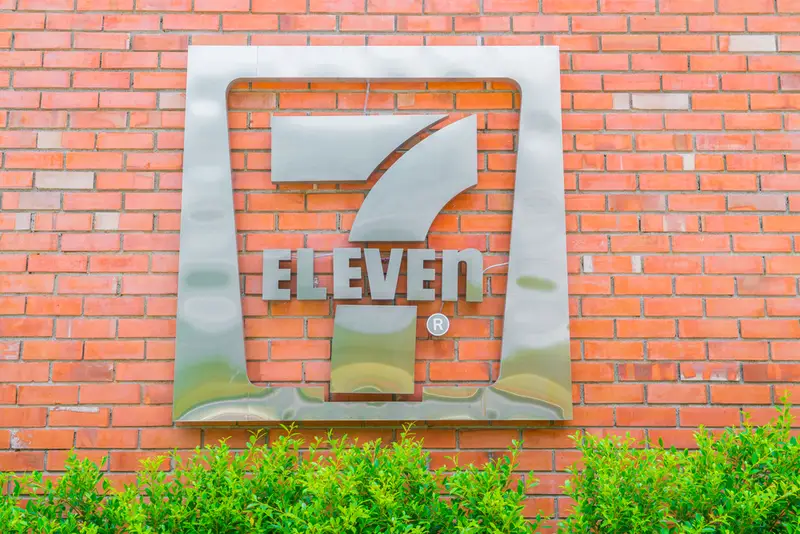 7 eleven convenience stores logo on brick wall