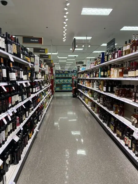 Target selling alcohol, an aisle of booze for sale in target. 
